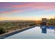 Stunning pool with picturesque sunset and mountain views at 9820 E Thompson Peak Pkwy # 629, Scottsdale, AZ 85255