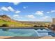 Sparkling pool and spa offer breathtaking views of the valley and mountains at 9820 E Thompson Peak Pkwy # 629, Scottsdale, AZ 85255