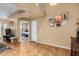 Open living space showcases tile floors with adjacent access to a bedroom and hall closet at 10136 E Southern Ave # 3065, Mesa, AZ 85209