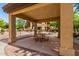 Shaded outdoor picnic area with seating, located in a well-maintained community space with desert landscaping at 10136 E Southern Ave # 3065, Mesa, AZ 85209