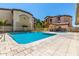 Community pool with clear blue water, lounge chairs, and a spa, surrounded by apartment buildings at 10136 E Southern Ave # 3065, Mesa, AZ 85209