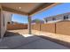 This backyard features a covered patio, perfect for outdoor entertaining and relaxation at 11627 W Beck Ave, Youngtown, AZ 85363