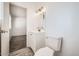 Modern bathroom with vanity sink and toilet at 12021 N Riviera Ct, Sun City, AZ 85351