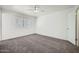 Cozy bedroom with carpet and bright natural light at 12021 N Riviera Ct, Sun City, AZ 85351