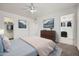 Comfortable main bedroom with a walk-in closet and en-suite bathroom at 12021 N Riviera Ct, Sun City, AZ 85351