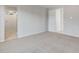 A spacious bedroom with an en suite bathroom featuring a walk-in shower for a modern, clean aesthetic at 13548 W Copperleaf Ln, Peoria, AZ 85383