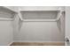 A walk-in closet with ample storage space and shelving, providing practical organization at 13548 W Copperleaf Ln, Peoria, AZ 85383