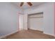 Cozy bedroom features a closet and ensuite bathroom, offering privacy and convenience at 1380 W Angus Rd, San Tan Valley, AZ 85143