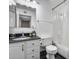 Cozy bathroom with a shower and tub combination, black tile flooring, and a white vanity at 14644 N Yerba Buena Way # C, Fountain Hills, AZ 85268