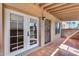Cozy outdoor patio features tile flooring, exposed beam ceiling, and natural light at 14644 N Yerba Buena Way # C, Fountain Hills, AZ 85268