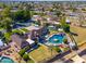 Luxury home featuring an exquisite backyard oasis, an in-ground pool, and meticulous landscaping at 1520 E Elmwood Cir, Mesa, AZ 85203