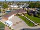 Expansive property with a beautiful brick home, three-car garage, and professionally landscaped yard at 1520 E Elmwood Cir, Mesa, AZ 85203