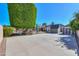 View of the backyard showcasing a full basketball court, and privacy landscaping at 1520 E Elmwood Cir, Mesa, AZ 85203