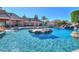Enjoy a luxurious pool with rock features, waterfall and landscaping at 1520 E Elmwood Cir, Mesa, AZ 85203