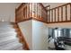 Carpeted staircase with decorative railing, leading to the living room at 1520 E Elmwood Cir, Mesa, AZ 85203