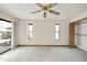 Light-filled bedroom featuring balcony, plush carpet and ample natural light at 16615 E Gunsight Dr # 205, Fountain Hills, AZ 85268