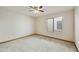 Empty bedroom with neutral carpet and a window at 16615 E Gunsight Dr # 205, Fountain Hills, AZ 85268