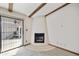 Cozy corner fireplace and sliding glass doors to the outdoor patio at 16615 E Gunsight Dr # 205, Fountain Hills, AZ 85268