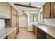 This kitchen features ample wood cabinets, stainless steel appliances and tile floors at 16615 E Gunsight Dr # 205, Fountain Hills, AZ 85268