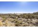 Scenic view from a condo balcony overlooking desert landscape with mountains in the distance at 16615 E Gunsight Dr # 205, Fountain Hills, AZ 85268