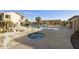 Community pool and spa area with ample seating, surrounded by lush landscaping and desert plants at 16615 E Gunsight Dr # 205, Fountain Hills, AZ 85268