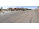 Community street view showing well-maintained roads and desert landscaping, set against a backdrop of mountains at 16615 E Gunsight Dr # 205, Fountain Hills, AZ 85268