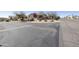 Scenic street view of a community featuring desert landscaping and mountain views in the background at 16615 E Gunsight Dr # 205, Fountain Hills, AZ 85268