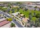Community park with an aerial perspective, featuring a basketball court, volleyball court, and outdoor stage at 17254 W Marshall Ln, Surprise, AZ 85388