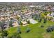 Scenic aerial view of neighborhood park with a basketball court, volleyball court and covered picnic area at 17254 W Marshall Ln, Surprise, AZ 85388