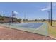 Outdoor basketball court surrounded by landscaping and neighborhood homes at 17254 W Marshall Ln, Surprise, AZ 85388