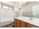 Bathroom featuring a tub shower and a vanity with a white countertop at 17254 W Marshall Ln, Surprise, AZ 85388