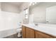 Bathroom with a vanity, toilet, shower, and tub combination at 17254 W Marshall Ln, Surprise, AZ 85388