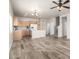 An open-concept living space connects the kitchen and living room at 17254 W Marshall Ln, Surprise, AZ 85388