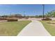 Community skate park featuring ramps, rails, and smooth concrete surfaces designed for skateboarders and inline skaters at 17254 W Marshall Ln, Surprise, AZ 85388
