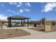 Magnolia Park featuring covered picnic area, benches and desert landscaping at 18490 N Tanners Way, Maricopa, AZ 85138