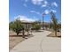 Community park featuring walking path, picnic area and desert landscaping at 18490 N Tanners Way, Maricopa, AZ 85138