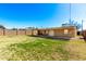 Spacious backyard with a covered patio, perfect for outdoor entertaining and relaxation at 1926 E Clarendon Ave, Phoenix, AZ 85016