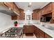 Well-appointed kitchen with stainless steel appliances, granite counters, and ample cabinet space at 1926 E Clarendon Ave, Phoenix, AZ 85016