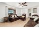 Bright living room with neutral walls, natural light, and comfortable seating at 1926 E Clarendon Ave, Phoenix, AZ 85016