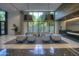 Bright lobby area with large windows, modern seating, and views of the outdoors at 200 W Portland St # 1217, Phoenix, AZ 85003