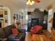 Comfortable living room featuring hardwood floors, modern furnishings, and abundant natural light at 2260 S Seminole Dr, Apache Junction, AZ 85119