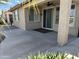 Covered patio with concrete flooring and a door leading into the house at 22988 W Twilight Trl, Buckeye, AZ 85326