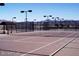 Outdoor tennis courts offer a great space to enjoy time outside playing in the fresh air and sunshine at 22988 W Twilight Trl, Buckeye, AZ 85326