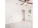 Bedroom with tile floors, closet, ceiling fan and a window for natural light at 2441 E Edgemont Ave, Phoenix, AZ 85008