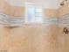 Tiled shower with glass window at 2441 E Edgemont Ave, Phoenix, AZ 85008