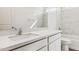 The bathroom features a white vanity, white countertop, and bathtub at 25308 W Sunland Ave, Buckeye, AZ 85326