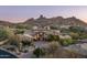 Breathtaking hillside home with a beautiful stone facade and desert landscaping at 27914 N 100Th Pl, Scottsdale, AZ 85262