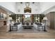 Bright living room with stone columns, high ceilings, and mountain views at 27914 N 100Th Pl, Scottsdale, AZ 85262