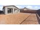 A spacious backyard with desert landscaping awaits your personal touch to make it your own at 32076 N 136Th Ave, Peoria, AZ 85383
