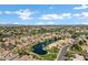 Lakeside community aerial view featuring mature trees, winding streets and mountain views in the background at 3431 S Felix Way, Chandler, AZ 85248